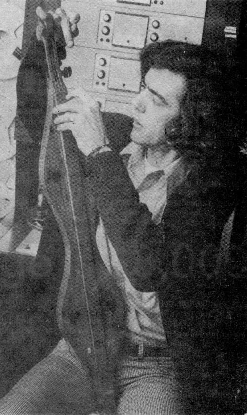 Mo with homemade dulcimer, from local newspaper story.
		The 4-channel 3M M23 1/2" recorder is over his shoulder